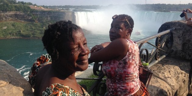 Maizel Hyde-Sinclair, left, and her sister Nellrene Walker, right, at Niagara Falls. While planning to travel back to her native Jamaica for Maizel's funeral, Nellrene and her son Jared discovered WestJet has a