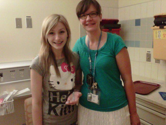 Alexandria poses at the hospital with her favourite nurse.