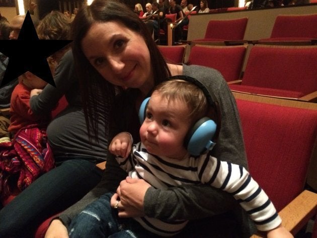 The author and her son, age 1, at a Raffi concert in 2017.