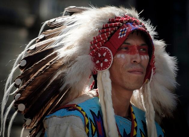 A Tsuut'ina band member rides in the Calgary Stampede parade on July 6, 2018.