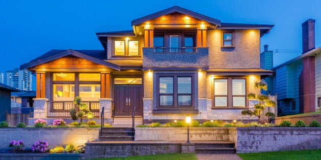 A luxury home is pictured in Vancouver, B.C. The top-tier housing markets in Toronto and Vancouver are headed in opposite directions, with fear driving Vancouver's market lower, Sotheby's says.