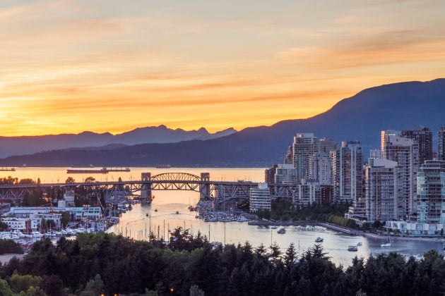 Vancouver skyline with Burrard bridge during sunset.