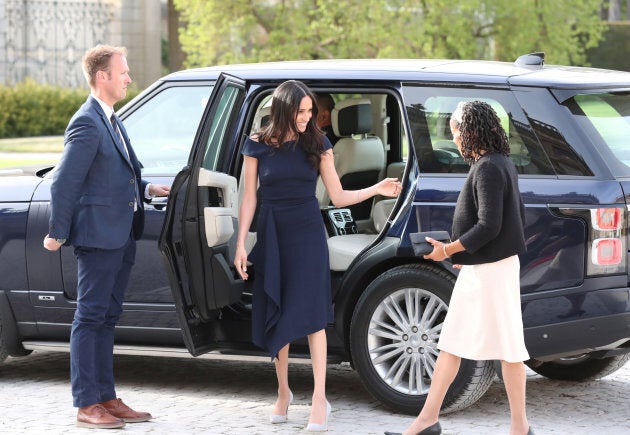 Meghan Markle wearing a Roland Mouret dress a day ahead of her wedding.