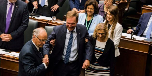 Ted Arnott is carried by fellow MPPs after his election as the new Speaker of the Ontario Legislative Assembly at Queen's Park in Toronto on July 11, 2018.