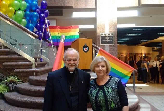 Cheri DiNovo with Rev. Brent Hawkes at the Toronto Police Service headquarters, when the police chief apologized for the 1981 bathhouse raids, on June 22, 2016.