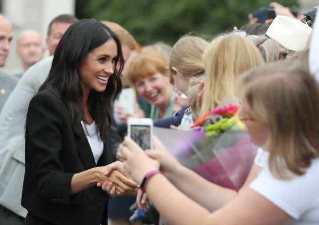 The Duke and Duchess of Sussex on a walkabout at Trinity College during their visit to Dublin, Ireland.