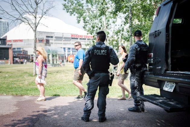 Toronto police emergency task force members are seen near the Rogers Centre on July 12, 2018.