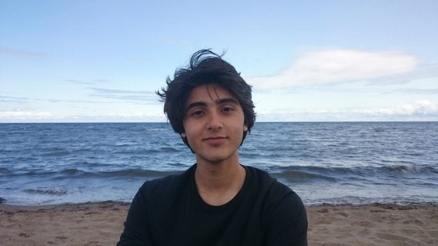 Yasser Al Asmi at the beach in Shediac, N.B.