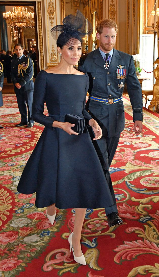 Meghan Markle wears a Dior dress at a reception to mark the centenary of the Royal Air Force on July 10, 2018.