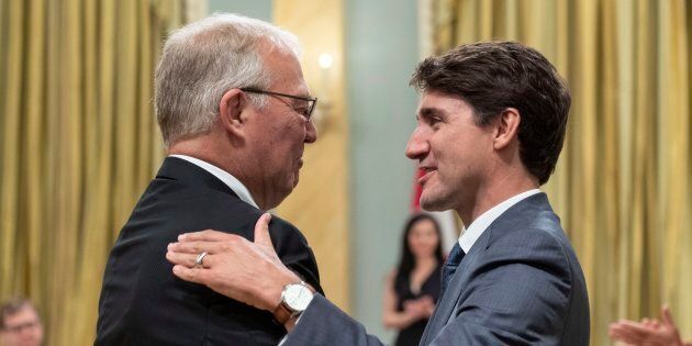 Liberal MP Bill Blair is congratulated by Prime Minister Justin Trudeau after being sworn in as minister of border security and organized crime reduction during a ceremony at Rideau Hall in Ottawa on July 18, 2018.