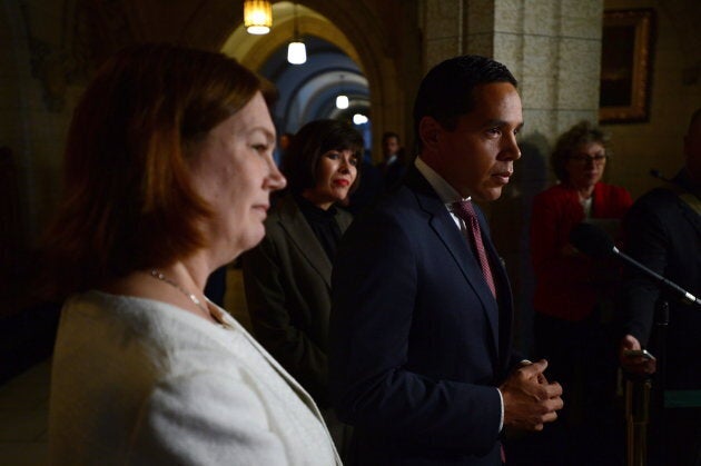 Indigenous Services Minister Jane Philpott (far left) looks on as Inuit Tapiriit Kanatami (ITK) President Natan Obed addresses media on Oct.5, 2017.