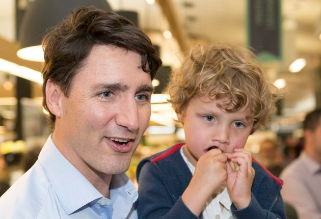 Prime Minister Justin Trudeau with his son Hadrien in Drummondville, Que., on June 23, 2018.