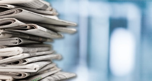 Pile of newspapers on background