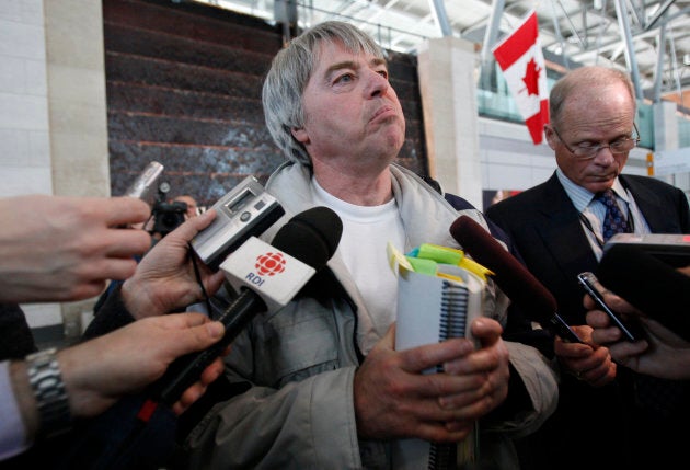 Robert Latimer, who was granted day parole after serving seven years in prison for the 1993 "mercy killing" of his severely handicapped daughter Tracy, speaks with journalists at the Ottawa International Airport in Ottawa on March 17, 2008.