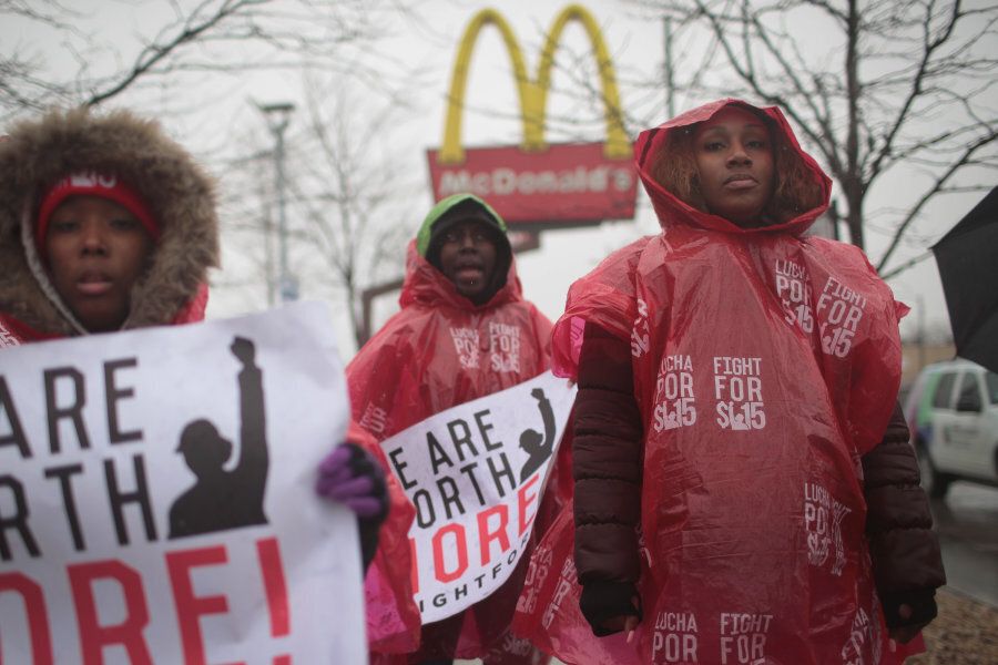 McDonald's workers protest outside of a company-owned restaurant on April 3, 2018 in Chicago, Ill. Employees at less desirable jobs, like those at fast food restaurants, would have more bargaining power with a basic income, the idea's proponents say.
