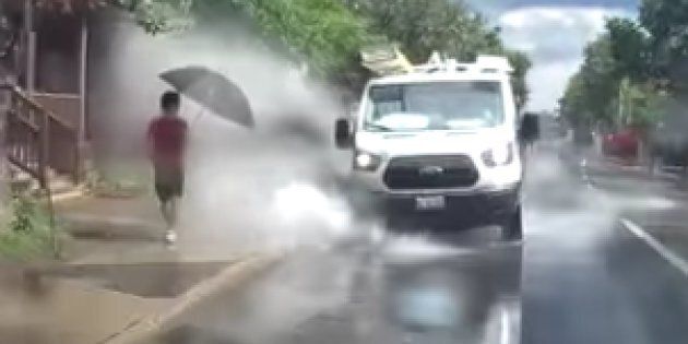 A video uploaded to YouTube shows a van in Ottawa driving over puddles and splashing pedestrians.