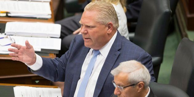 Ontario Premier Doug Ford exchanges words with NDP Leader Andrea Horwath during question period at Queen's Park, in Toronto on July 31, 2018.