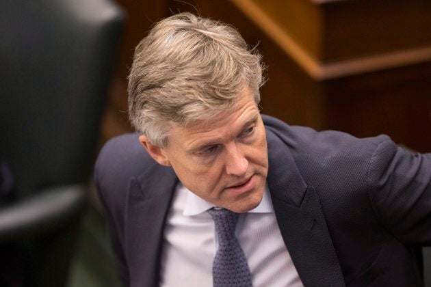 Ontario Environment Minister Rod Phillips takes his seat in the Ontario legislature in Toronto on July 30, 2018.