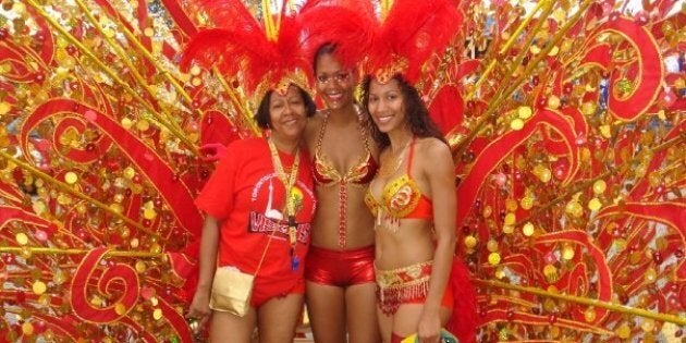 Mother Lou-Ann Crichton with her daughters Joella and Mischka Crichton at the 2008 Toronto Caribbean Carnival parade.