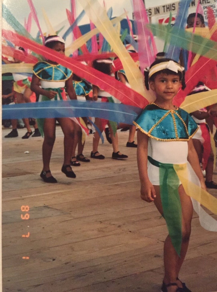 Mischka Crichton at age three playing mas at the St. Vincent Carnival in 1989