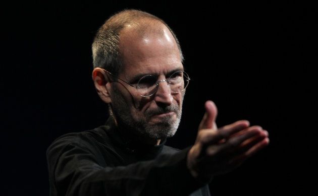 Apple CEO Steve Jobs gestures during his unveiling of the iPhone 4 in San Francisco, Calif., June 7, 2010. Jobs passed away in October, 2011.