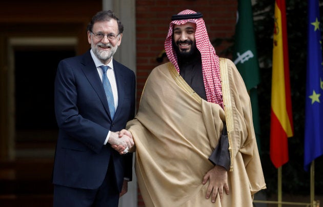 Saudi Arabia's Crown Prince Mohammed bin Salman (R) greets Spain's Prime Minister Mariano Rajoy (L) in Madrid, April 12, 2018.