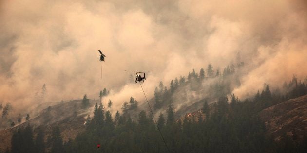 The Snowy Mountain wildfire, currently the largest in B.C., is visible from Cawston, B.C., Aug. 2, 2018.