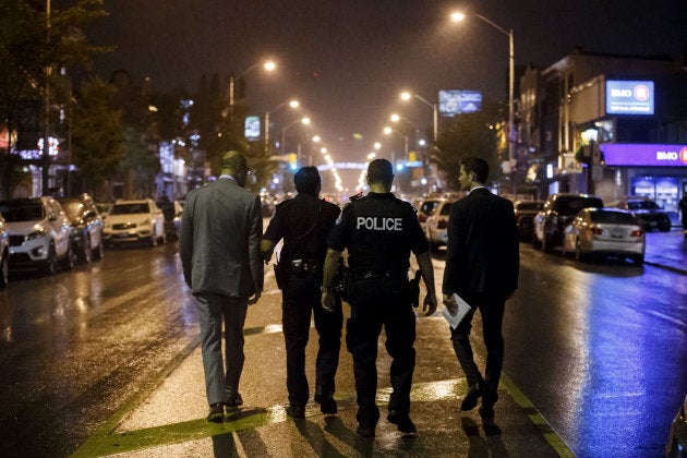 Toronto Police officers at the scene of the fatal mass shooting that claimed two young lives on July 22, 2018.