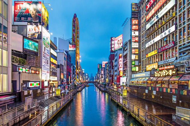 Dotonbori Canal on a rainy night in Osaka, Japan.