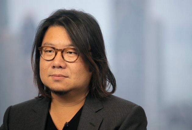 Kevin Kwan listens to a reporter's questions during an interview in Hong Kong.