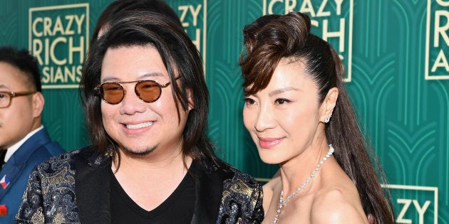 Author Kevin Kwan poses with actor Michelle Yeoh at the 'Crazy Rich Asians' Premiere at TCL Chinese Theatre on August 7, 2018.)