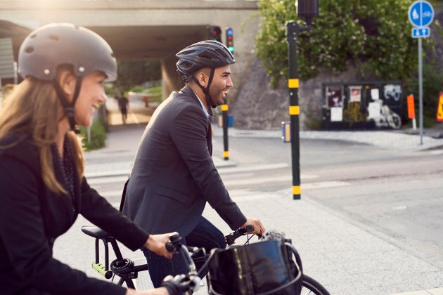 Biking to work with friends increasing happiness levels even more!