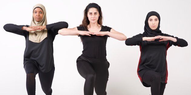 Thawrih co-founder Sarah Abood (centre) lunges with one of her employees and a model.
