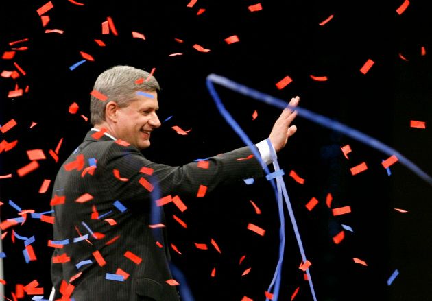Former prime minister Stephen Harper waves to supporters at his election night headquarters in Calgary on Oct. 14, 2008.