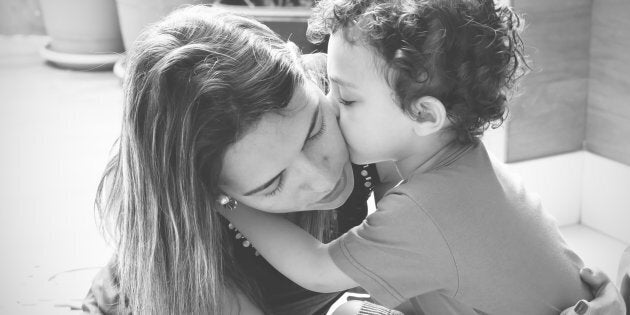 A stock photo shows a mother and son. A mom participating in Ontario's basic income pilot project says the money helped her set up a new life after leaving her abusive husband.