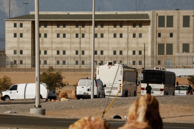 Immigration and Customs Enforcement (ICE) detainees arrive at a federal prison in Victorville, Cali.