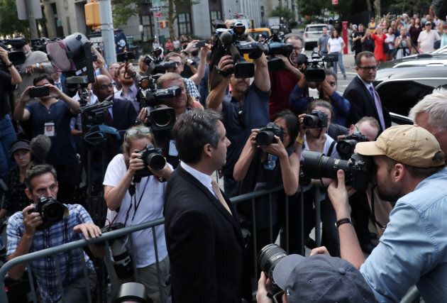 Michael Cohen faces a sea of news media as he exits a Manhattan courthouse on August 21, 2018.