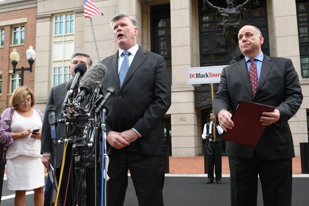 Defense attorneys Richard Westling, Kevin Downing and Thomas Zehnle speak to the media after the verdicts were read on the fourth day of jury deliberations in Paul Manafort's trial in Alexandria, Virginia on August 21, 2018.