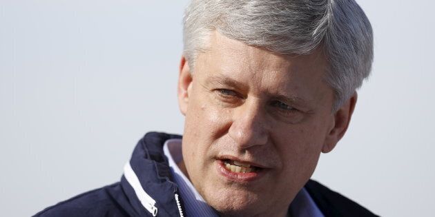 Stephen Harper speaks at rally on the tarmac at the airport in Regina on Oct. 18, 2015.