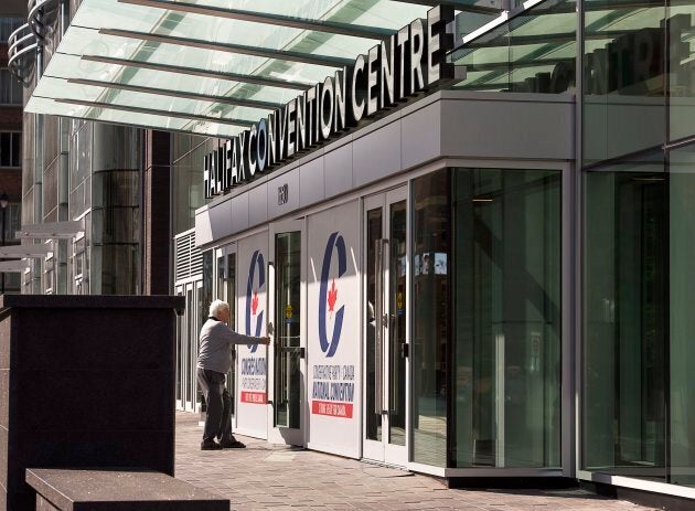 A delegate arrives at the Conservative Party of Canada national policy convention in Halifax on Friday.