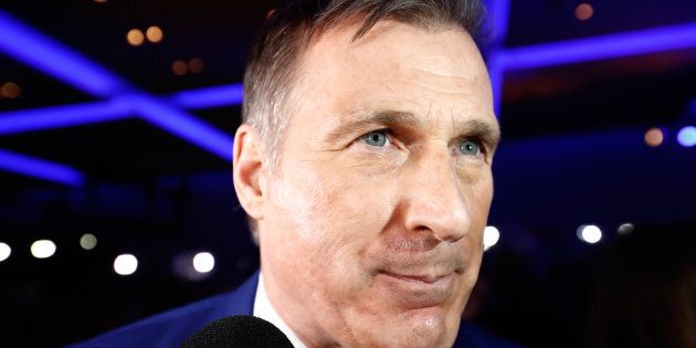 Maxime Bernier speaks to reporters during the Conservative Party of Canada leadership convention in Toronto on May 27, 2017.
