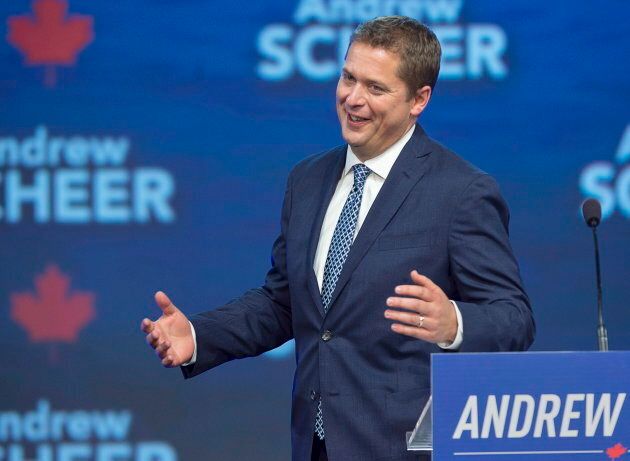 Conservative Leader Andrew Scheer reacts to the crowd as he prepares to speak in Halifax on Aug. 24, 2018.