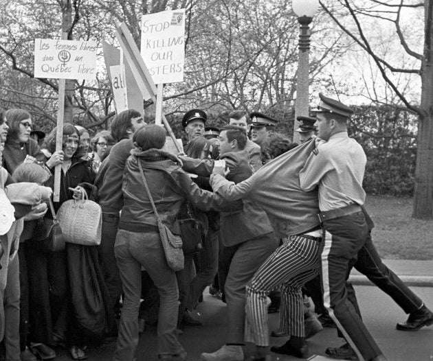 Members of Abortion Caravan demonstrate on Parliament Hill on May 9, 1970 as police try to control the crowd.