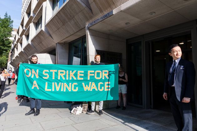 Striking cleaners stage a picket protest in London, England on Aug. 07, 2018.