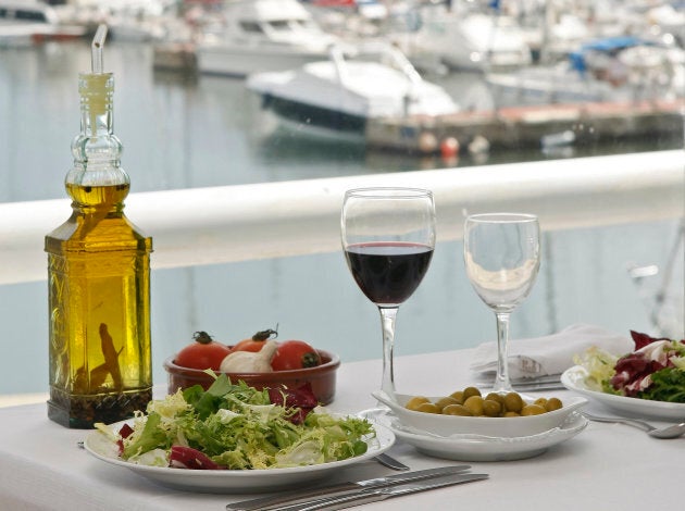 Food is seen on a table at a restaurant at the port of El Masnou, near Barcelona.