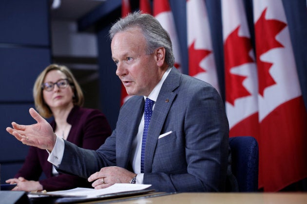 Bank of Canada Governor Stephen Poloz speaks during a news conference with Senior Deputy Governor Carolyn Wilkins in Ottawa, April 18. Poloz says Canada's flattening yield curve is not a problem, at least this time around.