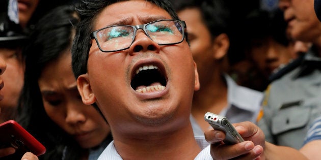 Reuters journalist Wa Lone leaves after listening to the verdict at Insein court in Yangon, Myanmar on September 3, 2018.