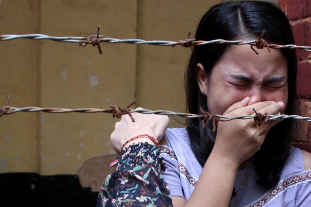 Chit Suu Win, wife of Reuters journalist Kyaw Soe Oo, reacts after listening to the the verdict in Yangon, Myanmar on September 3, 2018.