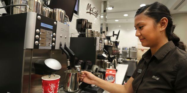 Employee Erika Resulto makes a soy latte at a McCafe outlet in Union Station, Toronto. The Ontario Chamber of Commerce is calling on the provincial government to scrap comprehensive labour laws passed by the previous Liberal government.