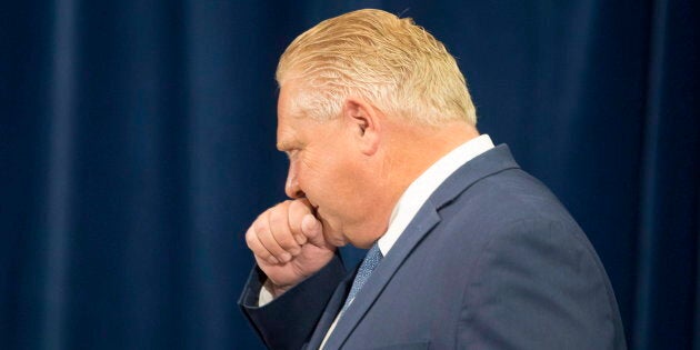 Ontario Premier Doug Ford makes his way to the podium for a press announcement in Toronto on Aug. 9, 2018.